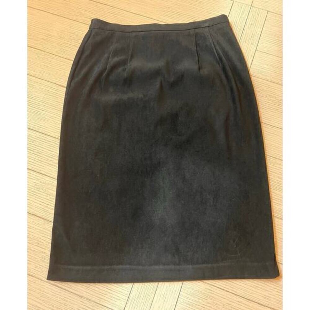 Koret poly, spandex knee length‎ black suede look skirt. Slit back. Sz 10